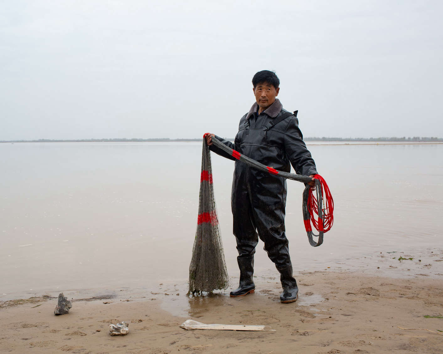 12 新鄉(xiāng)市原陽縣，捕魚的人，《黃河厚土》系列.jpg